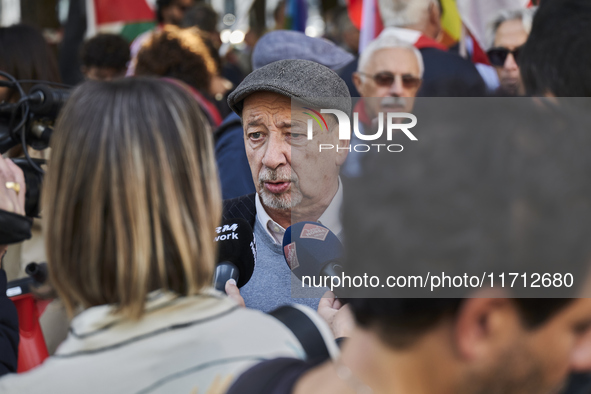 Gianfranco Pagliarulo, President of the National Association of Italian Partisans (ANPI), speaks at a rally advocating for world peace. Thou...