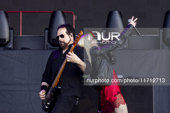 Mark Damon and Taylor Momsen of The Pretty Reckless perform at RCF Arena Campovolo in Reggio Emilia, Italy, on May 25, 2024. 