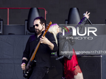 Mark Damon and Taylor Momsen of The Pretty Reckless perform at RCF Arena Campovolo in Reggio Emilia, Italy, on May 25, 2024. (