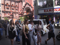 Tourists take pictures in front of the Red Mosque in Colombo, Sri Lanka, on October 26, 2024.   (