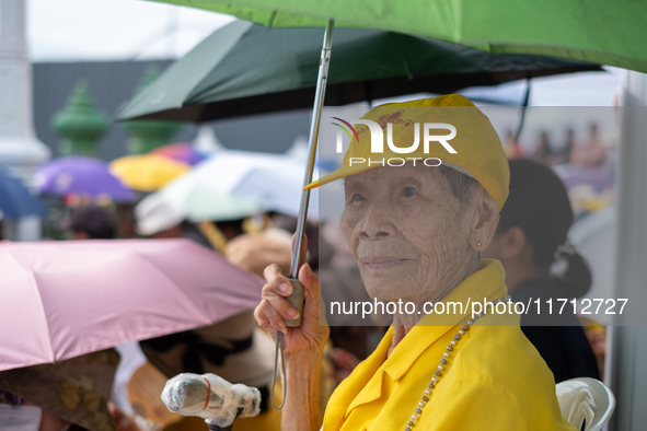 Thousands of well-wishers turn up along the shores of the Chao Phraya River in Bangkok, Thailand, on October 27, 2024, to watch Thai King Ma...