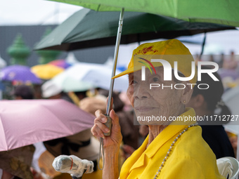 Thousands of well-wishers turn up along the shores of the Chao Phraya River in Bangkok, Thailand, on October 27, 2024, to watch Thai King Ma...