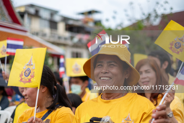 Thousands of well-wishers turn up along the shores of the Chao Phraya River in Bangkok, Thailand, on October 27, 2024, to watch Thai King Ma...