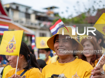 Thousands of well-wishers turn up along the shores of the Chao Phraya River in Bangkok, Thailand, on October 27, 2024, to watch Thai King Ma...