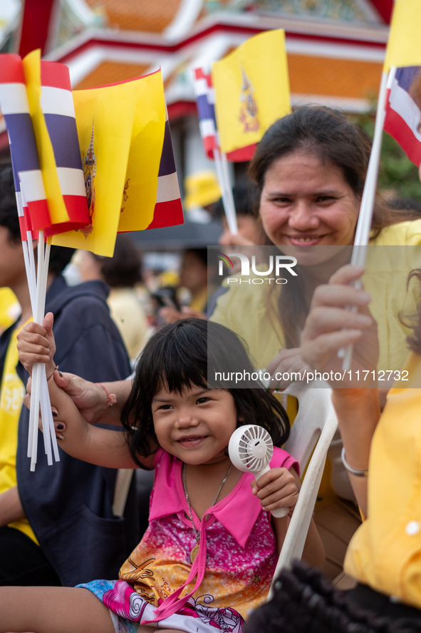 Thousands of well-wishers turn up along the shores of the Chao Phraya River in Bangkok, Thailand, on October 27, 2024, to watch Thai King Ma...