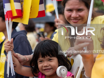 Thousands of well-wishers turn up along the shores of the Chao Phraya River in Bangkok, Thailand, on October 27, 2024, to watch Thai King Ma...