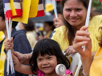 Thousands of well-wishers turn up along the shores of the Chao Phraya River in Bangkok, Thailand, on October 27, 2024, to watch Thai King Ma...