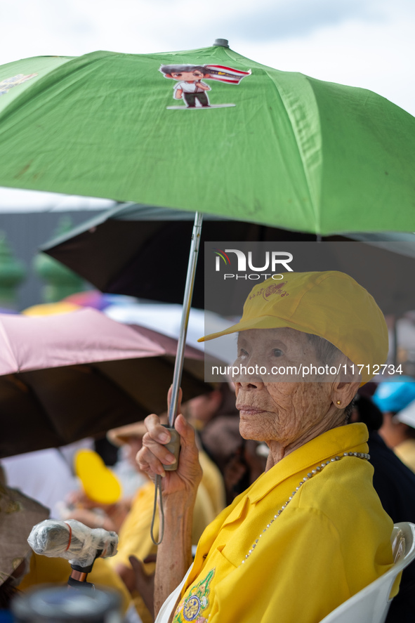 Thousands of well-wishers turn up along the shores of the Chao Phraya River in Bangkok, Thailand, on October 27, 2024, to watch Thai King Ma...