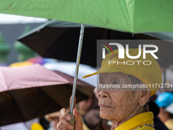 Thousands of well-wishers turn up along the shores of the Chao Phraya River in Bangkok, Thailand, on October 27, 2024, to watch Thai King Ma...