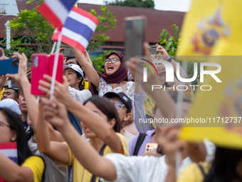 Thousands of well-wishers turn up along the shores of the Chao Phraya River in Bangkok, Thailand, on October 27, 2024, to watch Thai King Ma...