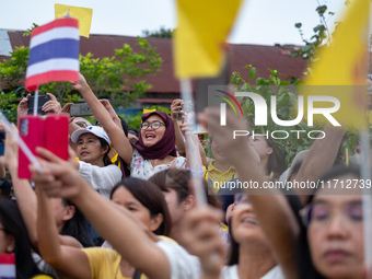 Thousands of well-wishers turn up along the shores of the Chao Phraya River in Bangkok, Thailand, on October 27, 2024, to watch Thai King Ma...