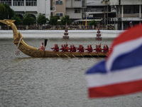 The Royal Barge 'Suphannahong', meaning Golden Swan, transports the king and queen of Thailand during the Royal Barge Procession for the Roy...