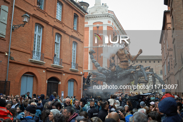 Lilith, the scorpion woman, appears on a small street in Toulouse, France, on October 26, 2024. French street show creator Francois Delarozi...