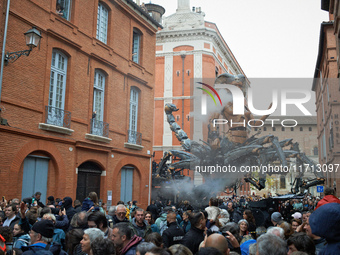 Lilith, the scorpion woman, appears on a small street in Toulouse, France, on October 26, 2024. French street show creator Francois Delarozi...