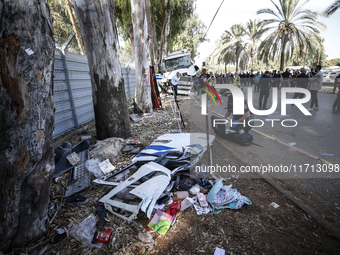 Medical and security teams respond to the scene where a truck crashed into a bus stop south of Tel Aviv, Israel, on October 27, 2024. The in...