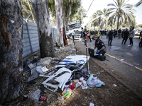 Medical and security teams respond to the scene where a truck crashed into a bus stop south of Tel Aviv, Israel, on October 27, 2024. The in...