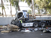 Medical and security teams respond to the scene where a truck crashed into a bus stop south of Tel Aviv, Israel, on October 27, 2024. The in...