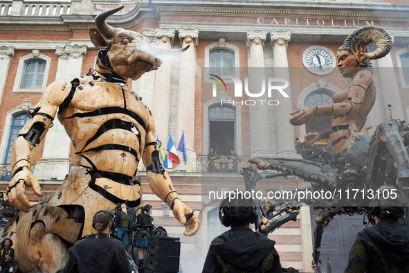 Asterion and Lilith stand face to face in front of the Capitole, the town hall of Toulouse. French street show creator Francois Delaroziere,...