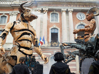 Asterion and Lilith stand face to face in front of the Capitole, the town hall of Toulouse. French street show creator Francois Delaroziere,...