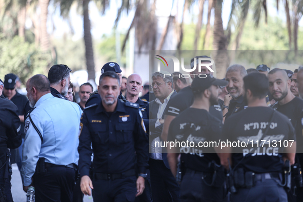 Medical and security teams respond to the scene where a truck crashed into a bus stop south of Tel Aviv, Israel, on October 27, 2024. The in...