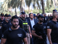 Medical and security teams respond to the scene where a truck crashed into a bus stop south of Tel Aviv, Israel, on October 27, 2024. The in...