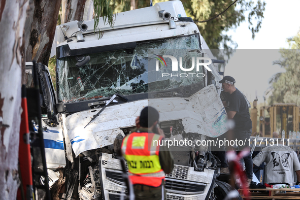 Medical and security teams respond to the scene where a truck crashed into a bus stop south of Tel Aviv, Israel, on October 27, 2024. The in...