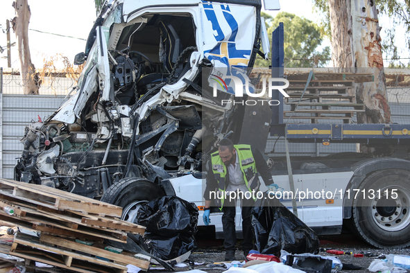 Medical and security teams respond to the scene where a truck crashed into a bus stop south of Tel Aviv, Israel, on October 27, 2024. The in...