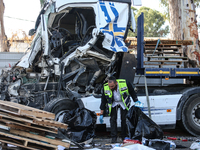 Medical and security teams respond to the scene where a truck crashed into a bus stop south of Tel Aviv, Israel, on October 27, 2024. The in...