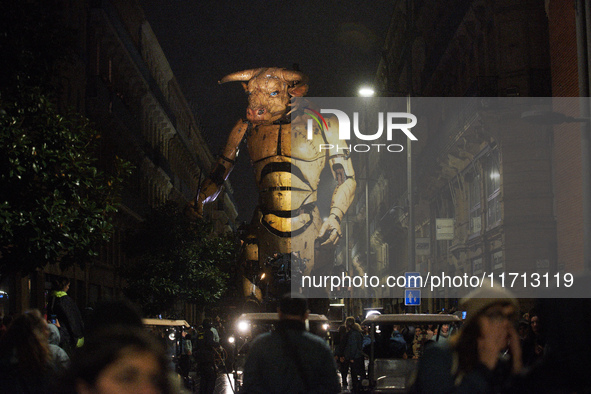 Asterion the Minotaur wanders the streets of Toulouse at night. French street show creator Francois Delaroziere, director of the art company...