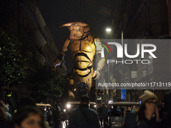 Asterion the Minotaur wanders the streets of Toulouse at night. French street show creator Francois Delaroziere, director of the art company...