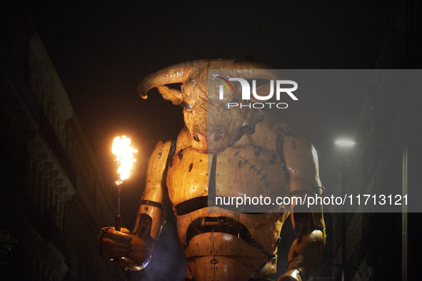 Asterion the Minotaur wanders the streets of Toulouse at night. French street show creator Francois Delaroziere, director of the art company...