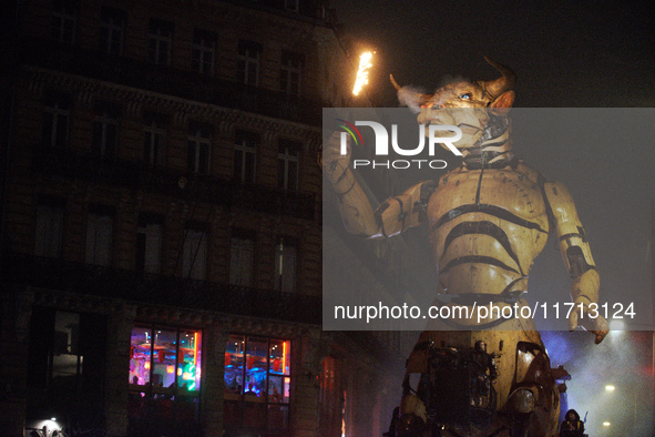 Asterion the Minotaur wanders in the streets of Toulouse, France, on October 26, 2024, at night. French street show creator Francois Delaroz...