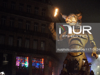 Asterion the Minotaur wanders in the streets of Toulouse, France, on October 26, 2024, at night. French street show creator Francois Delaroz...