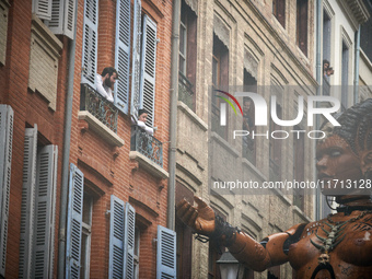 Lilith interacts with spectators in the streets of Toulouse. French street show creator Francois Delaroziere, director of the art company 'L...