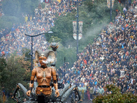 Thousands of people follow Lilith in the streets of Toulouse. French street show creator Francois Delaroziere, director of the art company '...