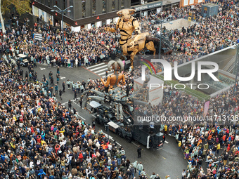 Asterion and Lilith are followed by thousands of people in the streets of Toulouse. French street show creator Francois Delaroziere, directo...