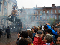 People take films and pictures of the arrival of Lilith in the main square of Toulouse, the Capitole. French street show creator Francois De...