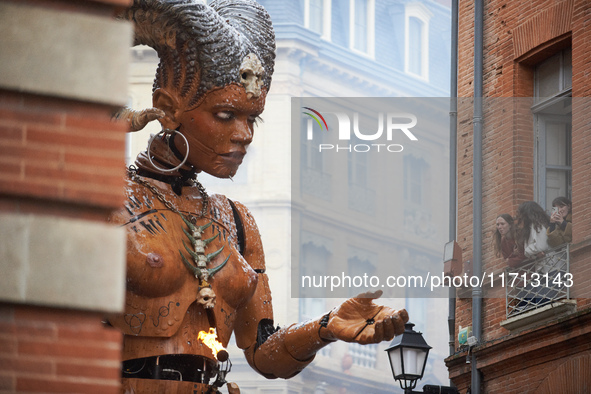 Lilith interacts with spectators in the streets of Toulouse. French street show creator Francois Delaroziere, director of the art company 'L...