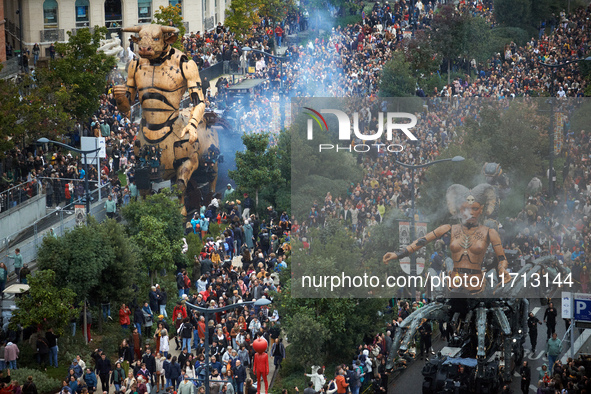 Asterion and Lilith are followed by thousands of people in the streets of Toulouse. French street show creator Francois Delaroziere, directo...