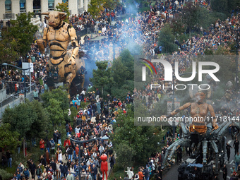 Asterion and Lilith are followed by thousands of people in the streets of Toulouse. French street show creator Francois Delaroziere, directo...