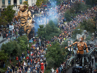 Asterion and Lilith are followed by thousands of people in the streets of Toulouse. French street show creator Francois Delaroziere, directo...