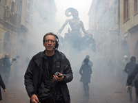 Francois Delaroziere, head of the art company 'La Machine,' guides Lilith in one of the tiniest streets of Toulouse. French street show crea...