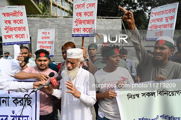 Capital market investors staged a protest rally in Dhaka, Bangladesh, on October 27, 2024, expressing discontent over the continued decline...