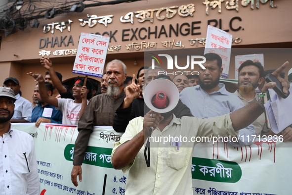 Capital market investors staged a protest rally in Dhaka, Bangladesh, on October 27, 2024, expressing discontent over the continued decline...