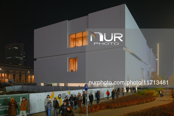 People wait in line outside the new Museum of Modern Art (Muzeum Sztuki Nowoczesnej) in Warsaw, Poland on 25 October, 2024. 