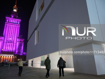 People wait in line outside the new Museum of Modern Art (Muzeum Sztuki Nowoczesnej) in Warsaw, Poland on 25 October, 2024. (