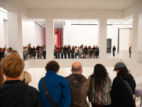 Visitors are seen on the evening of the opening of the new Museum of Modern Art (Muzeum Sztuki Nowoczesnej) in Warsaw, Poland on 25 October,...