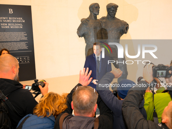 Mayor Rafal Trzaskowski is seen with media during the official opening at the opening of the new Museum of Modern Art (Muzeum Sztuki Nowocze...