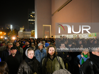 Visitors wait for the official opening at the opening of the new Museum of Modern Art (Muzeum Sztuki Nowoczesnej) in Warsaw, Poland on 25 Oc...