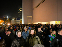 Visitors wait for the official opening at the opening of the new Museum of Modern Art (Muzeum Sztuki Nowoczesnej) in Warsaw, Poland on 25 Oc...